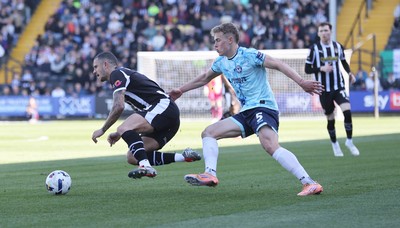 060426 - Notts County v Newport County - Sky Bet League 2 - Sven Sprangler of Newport and Oliver Norburn of Notts County