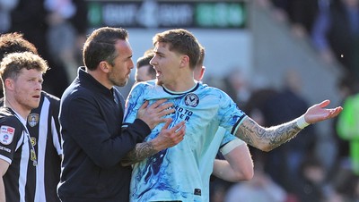 060426 - Notts County v Newport County - Sky Bet League 2 - Newport manager Christian Fuchs and James Crole of Newport seem to have an argument at the end of the match