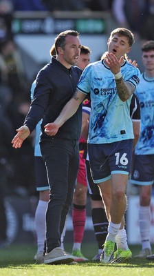 060426 - Notts County v Newport County - Sky Bet League 2 - Newport manager Christian Fuchs and James Crole of Newport seem to have an argument at the end of the match