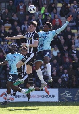 060426 - Notts County v Newport County - Sky Bet League 2 - Bobby Kamwa of Newport and Lucas Ness of Notts County