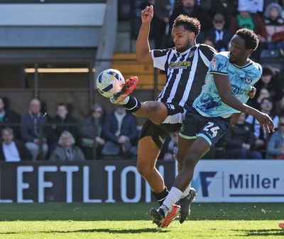 060426 - Notts County v Newport County - Sky Bet League 2 - Nathan Opoku of Newport and Jacob Bedeau of Notts County