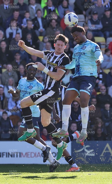 060426 - Notts County v Newport County - Sky Bet League 2 - Bobby Kamwa of Newport and Lucas Ness of Notts County