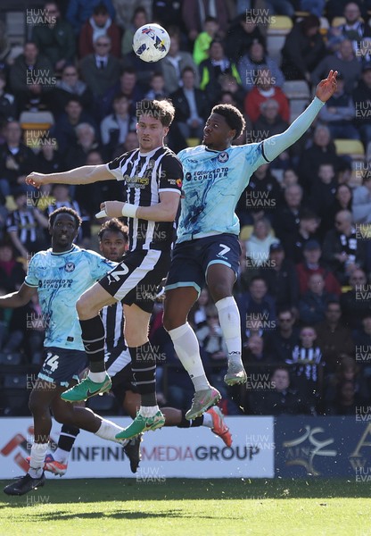 060426 - Notts County v Newport County - Sky Bet League 2 - Bobby Kamwa of Newport and Lucas Ness of Notts County