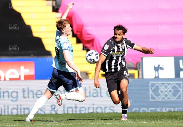 060426 - Notts County v Newport County - Sky Bet League 2 - Ged Garner of Newport and Jacob Bedeau of Notts County