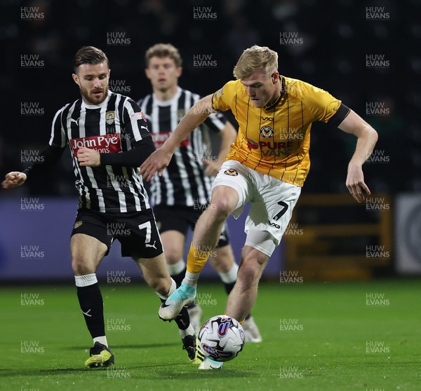 241023 - Notts County v Newport County - Sky Bet League 2 - Will Evans of Newport County receives long ball with Dan Crowley of Notts County 