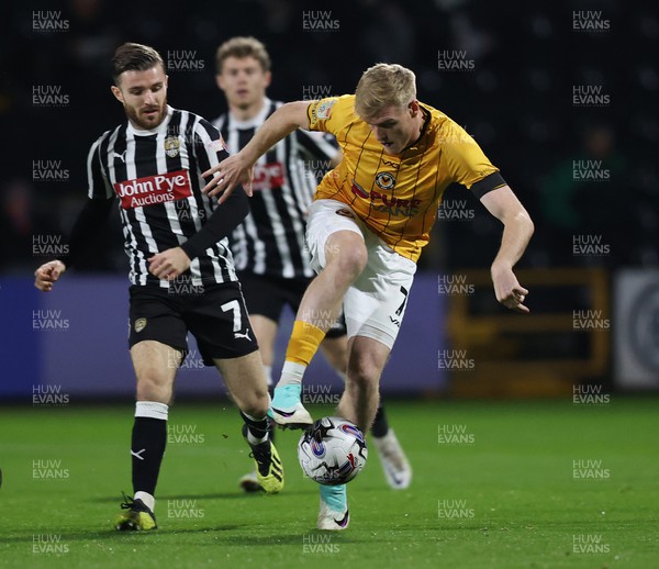 241023 - Notts County v Newport County - Sky Bet League 2 - Will Evans of Newport County receives long ball with Dan Crowley of Notts County 