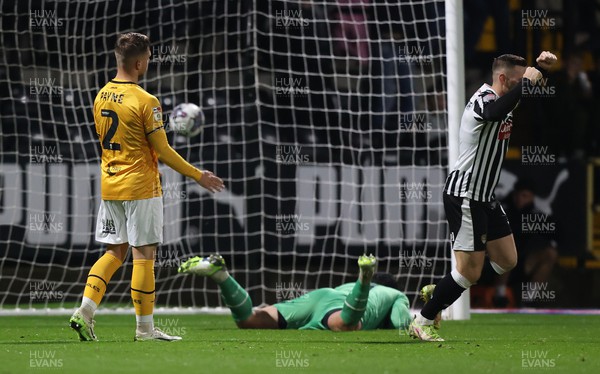 241023 - Notts County v Newport County - Sky Bet League 2 - Goalkeeper Nick Towsend of Newport County is floored while Macaulay Langstaff celebrates