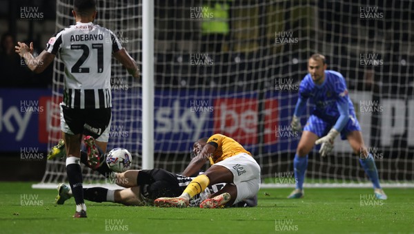 241023 - Notts County v Newport County - Sky Bet League 2 - Omar Bogle of Newport County brought down by Aden Baldwin of Notts County but no penalty given
