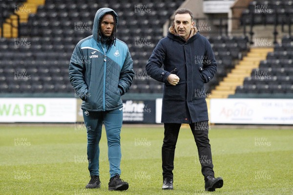 270118 - Notts County v Swansea City, FA Cup Fourth Round - Swansea City Manager Carlos Carvalhal (right) talks with Renato Sanches of Swansea City before the match