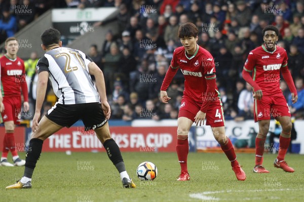 270118 - Notts County v Swansea City, FA Cup Fourth Round - Ki Sung Yueng of Swansea City (right) in action with  Noor Husin of Notts County