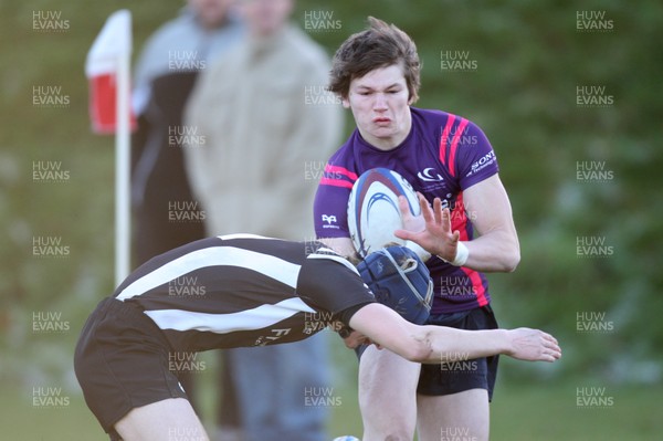 19.01.11.... Neath Port Talbot College v Gower College Swansea, WRU/WRSU Colleges League -  Gower College Swansea's Connor Salter is tackled 