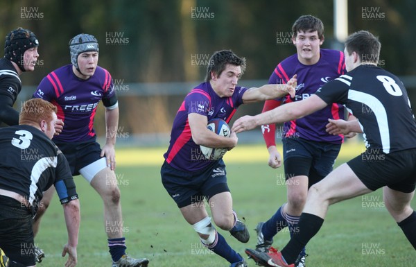 19.01.11.... Neath Port Talbot College v Gower College Swansea, WRU/WRSU Colleges League -  Gower College Swansea's Jon Pridgeon tests the NPTC defence 