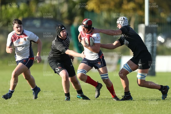 231019 - Neath Port Talbot College v Llandovery College, WRU National Schools and Colleges League - Ben Gregory of Llandovery College takes on Tristan Davies of NPTC