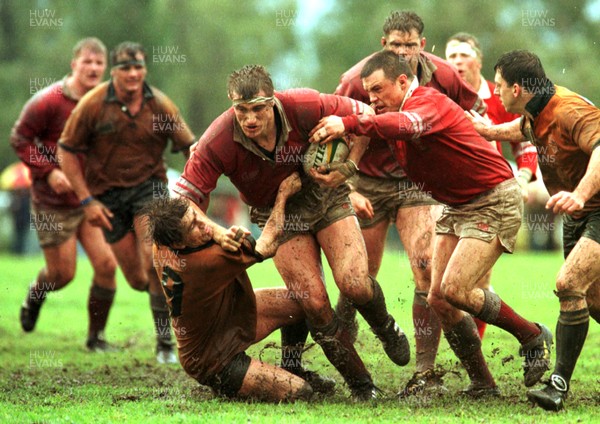 150696 - New South Wales Country v Wales - Steve Williams of Wales pushes off Steve Merrick with Simon Hill in support