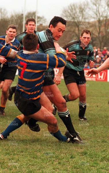 250395 - Old Penarthians v Cardiff - Hemi Taylor of Cardiff is tackled by Tony Bartlett