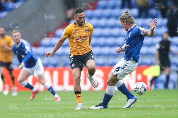 070821 - Oldham Athletic v Newport County, EFL Sky Bet League 2 - Robbie Willmott of Newport County and Carl Piergianni of Oldham Athletic compete for the ball