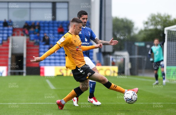 070821 - Oldham Athletic v Newport County, EFL Sky Bet League 2 - Lewis Collins of Newport County and Alan Sheehan of Oldham Athletic compete for the ball