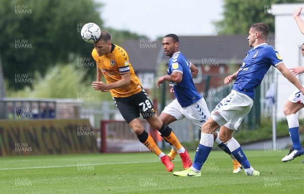 070821 - Oldham Athletic v Newport County, EFL Sky Bet League 2 - Mickey Demetriou of Newport County heads at goal only for it to be ruled out