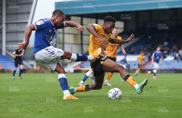 070821 - Oldham Athletic v Newport County, EFL Sky Bet League 2 -Timmy Abraham of Newport County wins the ball for Jordan Clarke of Oldham Athletic