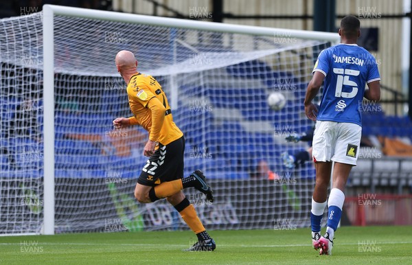 070821 - Oldham Athletic v Newport County, EFL Sky Bet League 2 - Kevin Ellison of Newport County watches as his header beats Oldham Athletic goalkeeper Danny Rogers to score goal
