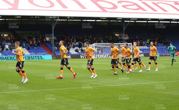 070821 - Oldham Athletic v Newport County, EFL Sky Bet League 2 - Newport County warm up in front of their traveling supporters
