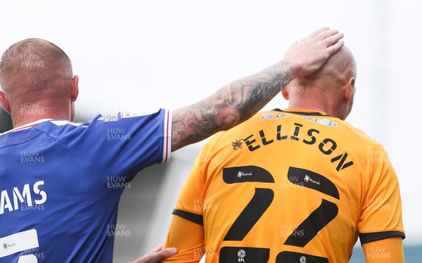 070821 - Oldham Athletic v Newport County, EFL Sky Bet League 2 - Kevin Ellison of Newport County gets a tap on the head from Nicky Adams of Oldham Athletic