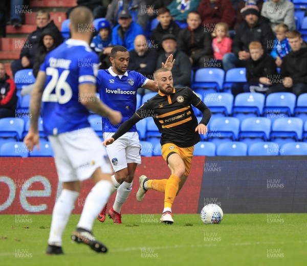 080918 - Oldham Athletic v Newport County - Sky Bet League 2 - Newport County defender Fraser Franks (5) chases the ball under pressure from Oldham Athletic midfielder Christopher Missilou (17)