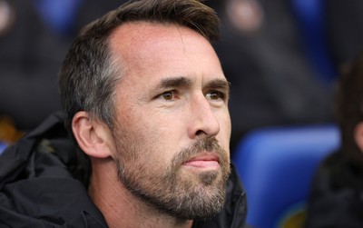 221125 - Oldham Athletic v Newport County - Sky Bet League 2 - Newport manager Christian Fuchs in dugout before match