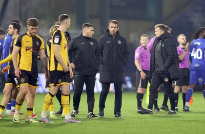 221125 - Oldham Athletic v Newport County - Sky Bet League 2 - Newport Manager Christian Fuchs joins team to applaud travelling fans