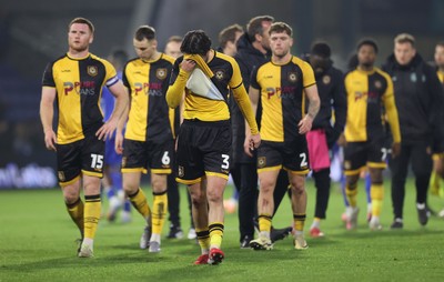 221125 - Oldham Athletic v Newport County - Sky Bet League 2 - Newport Manager Christian Fuchs and visibly upset Anthony Glennon of Newport and team at the end of the match