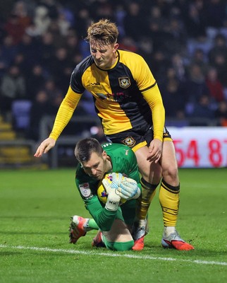 221125 - Oldham Athletic v Newport County - Sky Bet League 2 - Goalkeeper Mathew Hudsoc of Oldham fumbles the ball from incoming corner but charges into Ged Garner of Newport