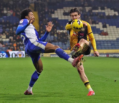 221125 - Oldham Athletic v Newport County - Sky Bet League 2 - Anthony Glennon of Newport and Kane Drummond of Oldham