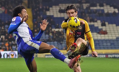 221125 - Oldham Athletic v Newport County - Sky Bet League 2 - Anthony Glennon of Newport and Kane Drummond of Oldham