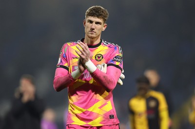 221125 - Oldham Athletic v Newport County - Sky Bet League 2 - Goalkeeper Jordan Wright of Newport salutes the travelling fans at the end of the match