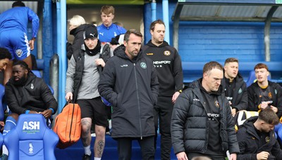 221125 - Oldham Athletic v Newport County - Sky Bet League 2 - Newport manager Christian Fuchs enters the dug out area