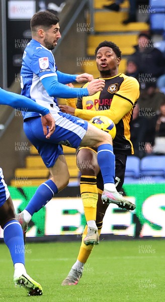 221125 - Oldham Athletic v Newport County - Sky Bet League 2 - Bobby Kamwa of Newport tries a shot on goal Also pictured, Tom Pete of Oldham