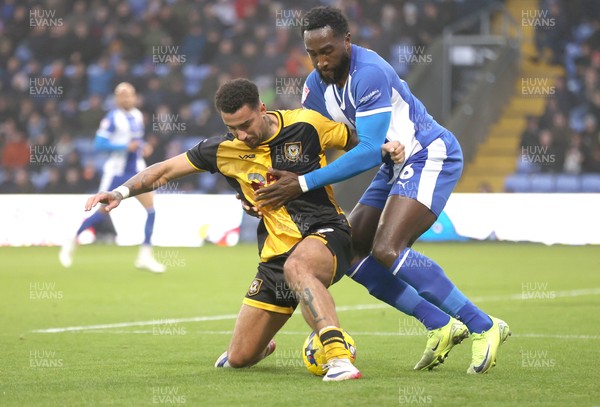 221125 - Oldham Athletic v Newport County - Sky Bet League 2 - Courtney Baker-Richardson of Newport and Manny Monthe of Oldham