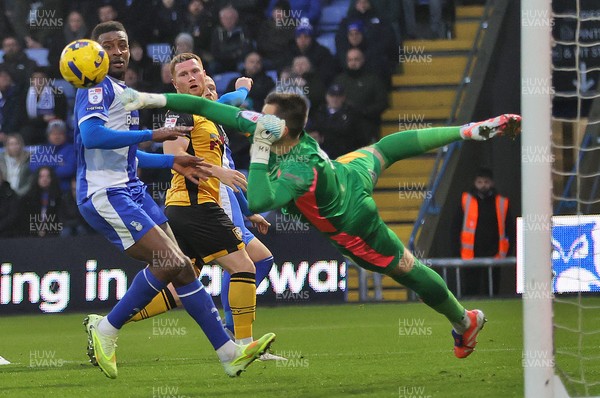 221125 - Oldham Athletic v Newport County - Sky Bet League 2 - Lee Jenkins of Newport header on goal saved by Goalkeeper Mathew Hudsoc of Oldham