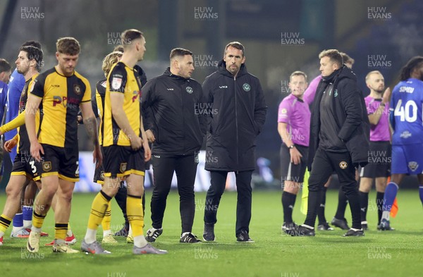 221125 - Oldham Athletic v Newport County - Sky Bet League 2 - Newport Manager Christian Fuchs joins team to applaud travelling fans