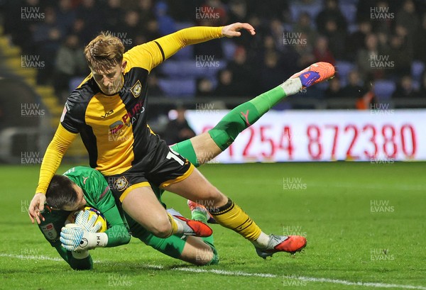 221125 - Oldham Athletic v Newport County - Sky Bet League 2 - Goalkeeper Mathew Hudsoc of Oldham fumbles the ball from incoming corner but charges into Ged Garner of Newport
