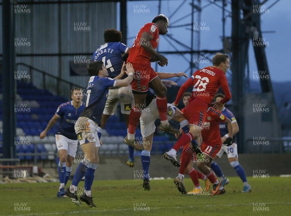 230121 - Oldham Athletic v Newport County - Sky Bet League 2 - Bunched in the goal mouth as David Longe-King of Newport County heads towards goal
