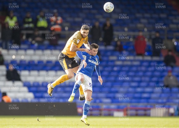 290220 - Oldham Athletic v Newport County - Sky Bet League 2 -  Ryan Inniss challenges for a header with Oldham Athletic's Zak Dearnley 