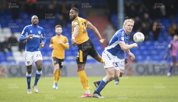 290220 - Oldham Athletic v Newport County - Sky Bet League 2 -  Jamille Matt of Newport County challenges for a header with Oldham Athletic's Carl Piergianni