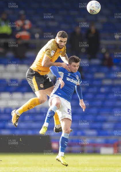 290220 - Oldham Athletic v Newport County - Sky Bet League 2 -  Ryan Inniss challenges for a header with Oldham Athletic's Zak Dearnley 