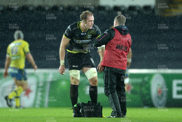 150116 - Ospreys v Clermont Auvergne - European Rugby Champions Cup -Alun Wyn Jones of Ospreys receives treatment