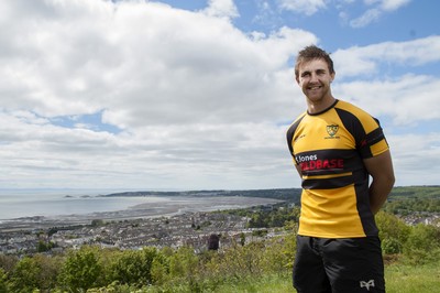 220513 - Ospreys - Pictured with Swansea Bay in the background is Ashley Beck in Skewen RFC kit