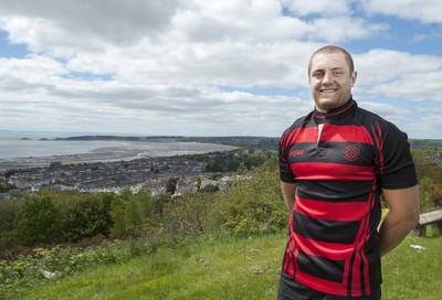 220513 - Ospreys - Pictured with Swansea Bay in the background is James King in Mold RFC kit