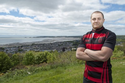 220513 - Ospreys - Pictured with Swansea Bay in the background is James King in Mold RFC kit