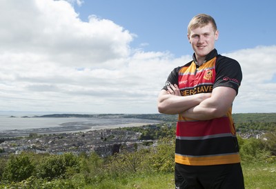 220513 - Ospreys - Pictured with Swansea Bay in the background is Daffyd Howells in Abercrave  kit