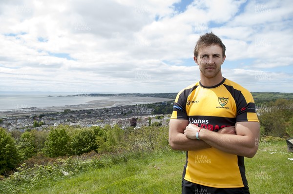 220513 - Ospreys - Pictured with Swansea Bay in the background is Ashley Beck in Skewen RFC kit